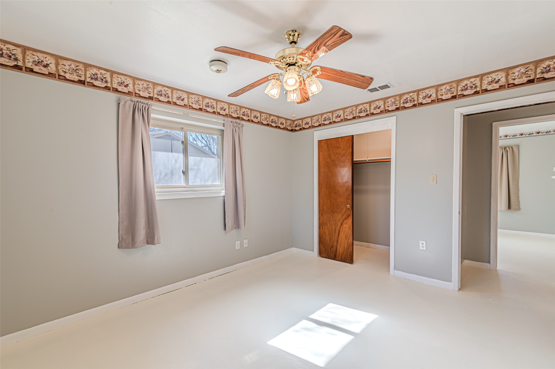 1126 10th Street Hempstead, TX 77445 - Photo 26 of 34 a view of an empty room with a window