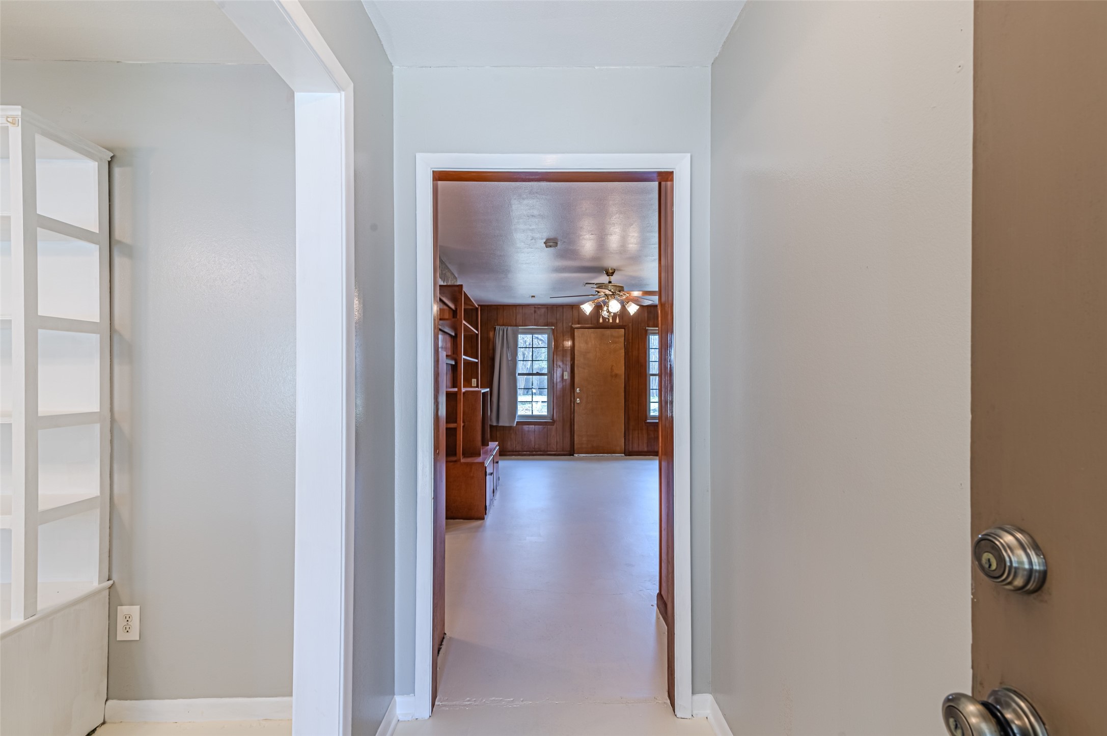1126 10th Street Hempstead, TX 77445 - Photo 27 of 34 a view of a hallway with a livingroom and a window