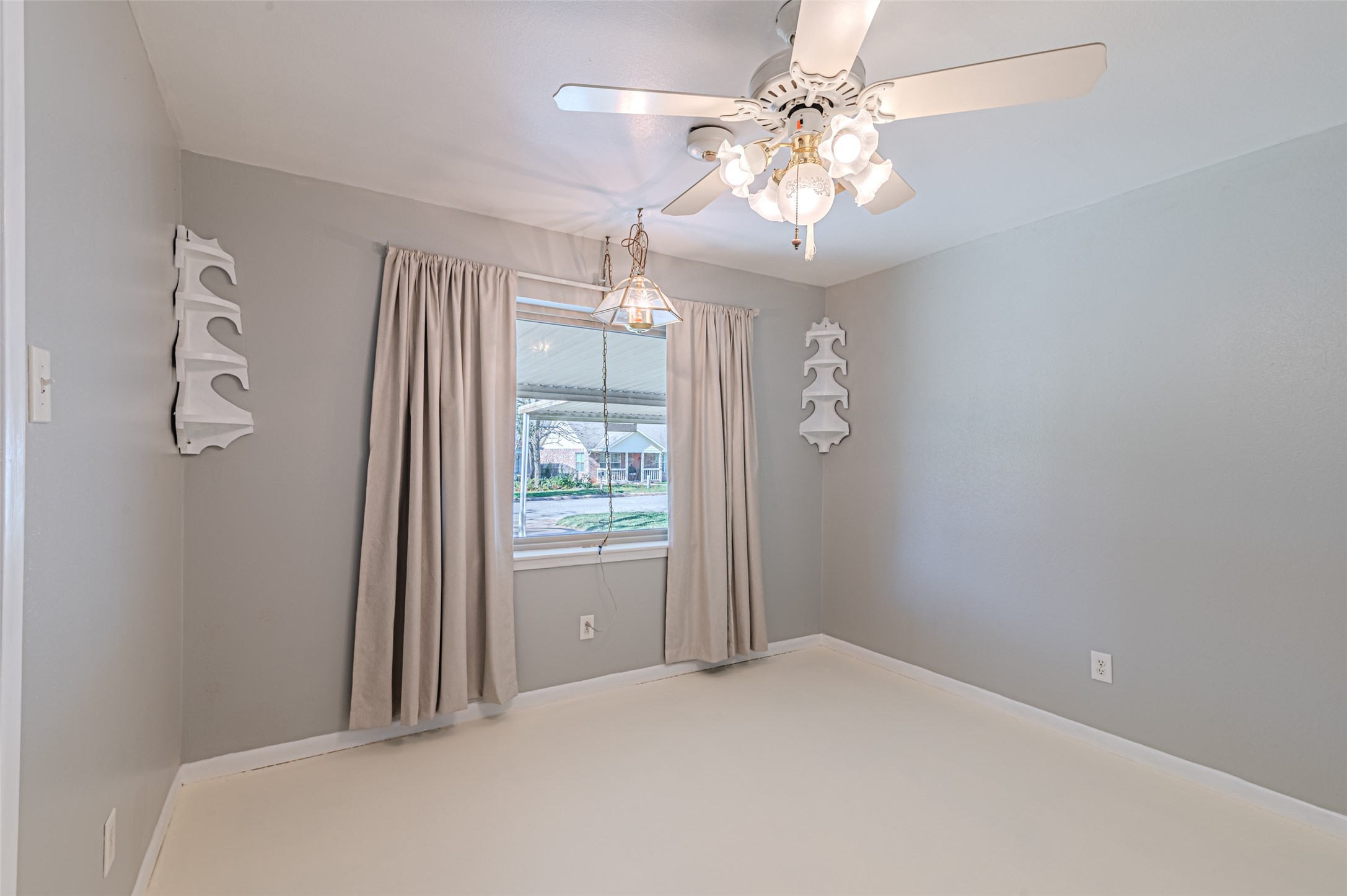 1126 10th Street Hempstead, TX 77445 - Photo 33 of 34 wooden floor in an empty room with a window