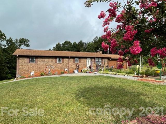 845 Sandy Level Church Road Bostic, NC 28018 - Photo 1 of 46 a front view of house with yard and seating