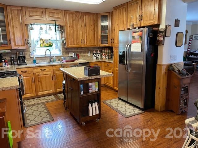 845 Sandy Level Church Road Bostic, NC 28018 - Photo 12 of 46 a kitchen with stainless steel appliances granite countertop a refrigerator stove top oven and sink