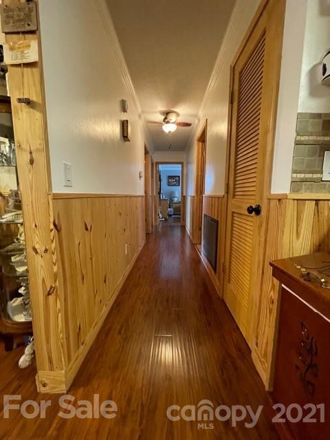 845 Sandy Level Church Road Bostic, NC 28018 - Photo 18 of 46 a view of a hallway with wooden floor
