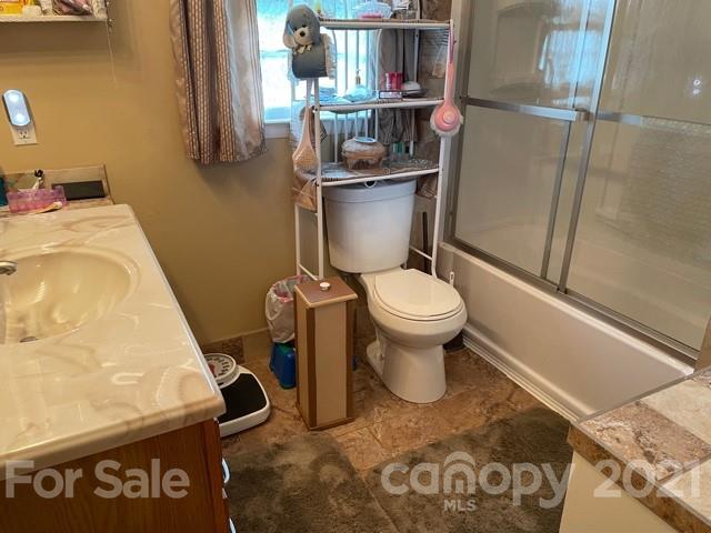 845 Sandy Level Church Road Bostic, NC 28018 - Photo 19 of 46 a bathroom with a toilet and a sink