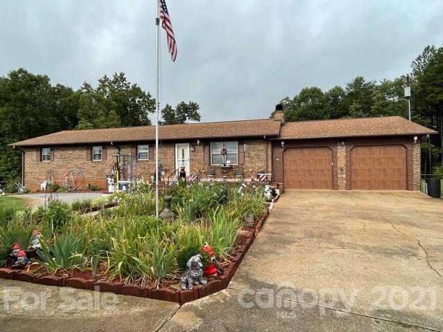 845 Sandy Level Church Road Bostic, NC 28018 - Photo 3 of 46 a front view of a house with garden