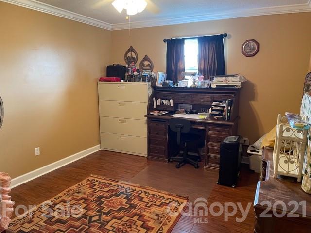 845 Sandy Level Church Road Bostic, NC 28018 - Photo 28 of 46 a room with a mirror and a dresser