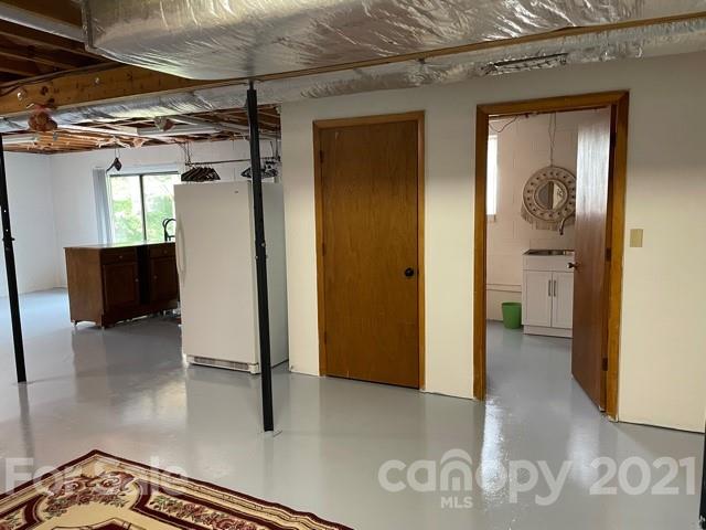 845 Sandy Level Church Road Bostic, NC 28018 - Photo 35 of 46 a view of a hallway with wooden floor