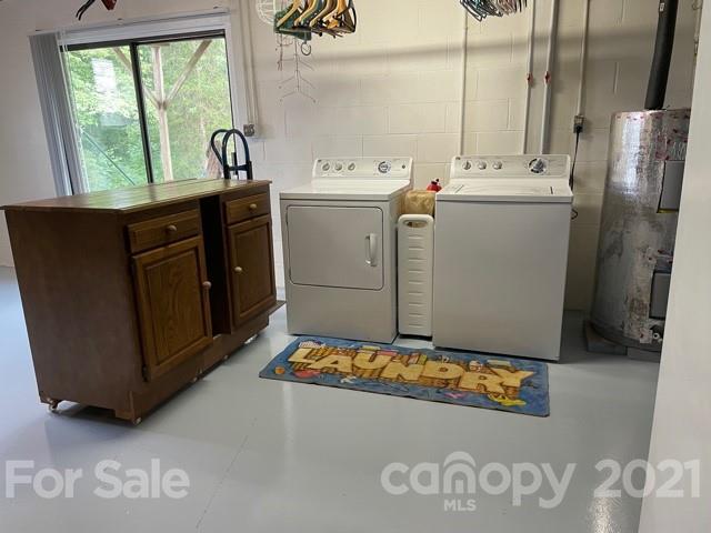 845 Sandy Level Church Road Bostic, NC 28018 - Photo 36 of 46 a room with water heater refrigerator washer and dryer