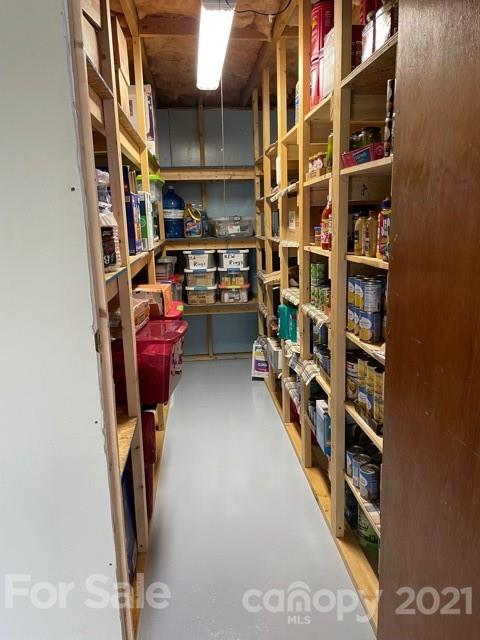 845 Sandy Level Church Road Bostic, NC 28018 - Photo 37 of 46 a view of walk in closet with clothes and shoes