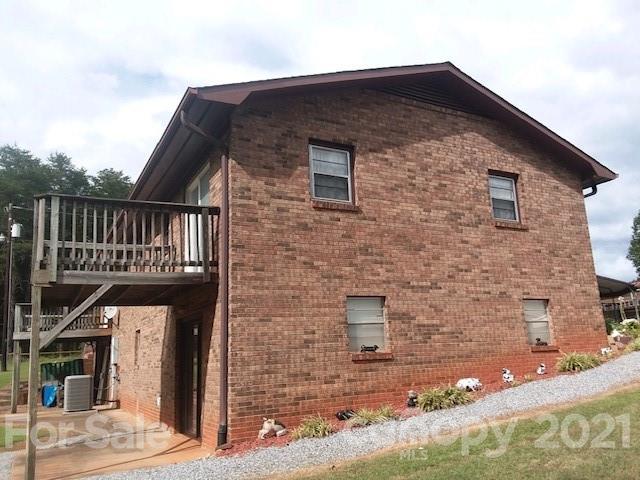 845 Sandy Level Church Road Bostic, NC 28018 - Photo 44 of 46 a front view of a house with parking