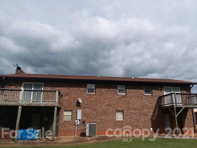 845 Sandy Level Church Road Bostic, NC 28018 - Photo 45 of 46 a front view of a house with garden