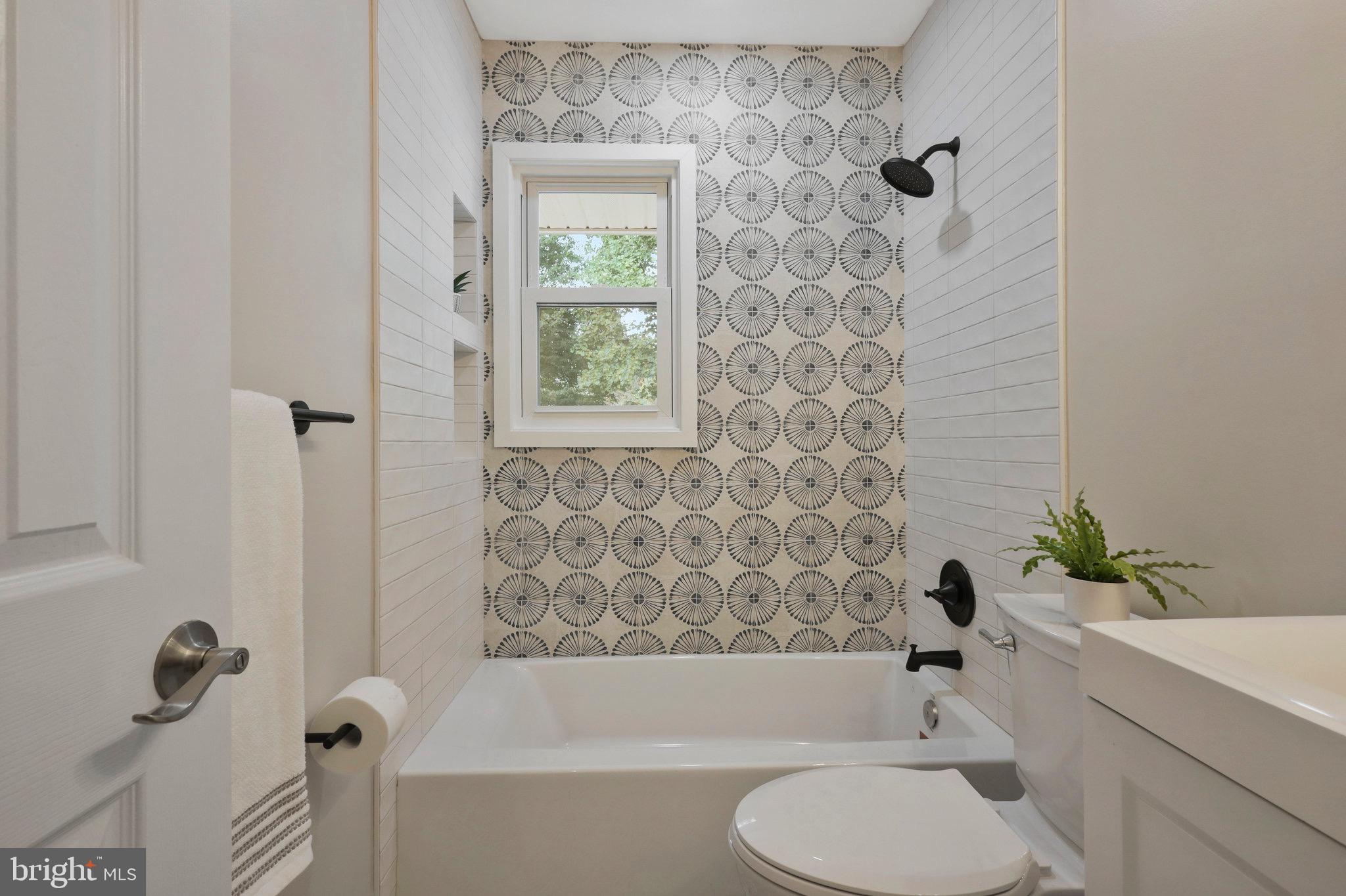 2342 Barbour Road Falls Church, VA 22043 - Photo 12 of 30 a bathroom with a toilet and a bathtub