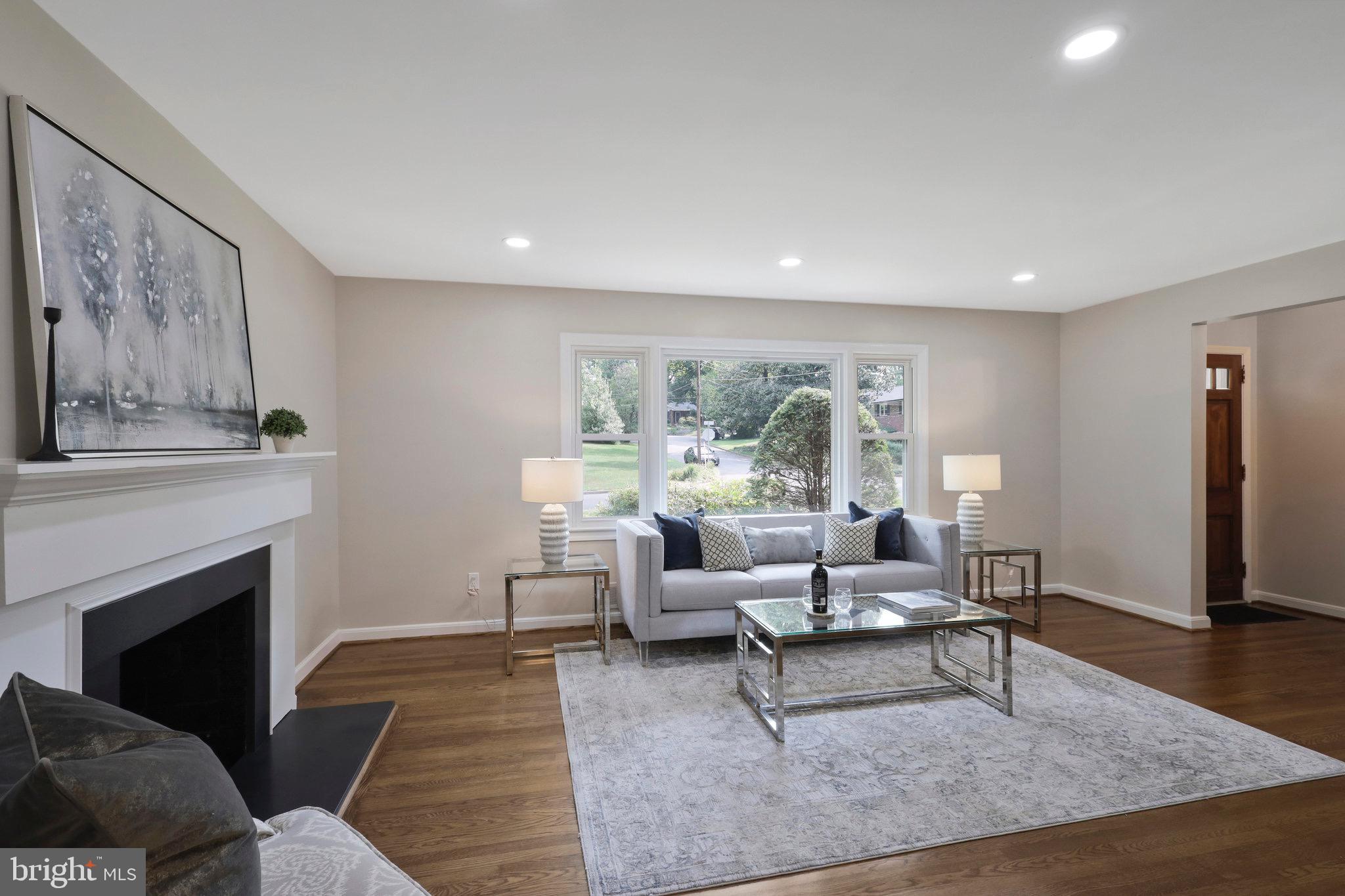 2342 Barbour Road Falls Church, VA 22043 - Photo 3 of 30 a living room with furniture and a fireplace