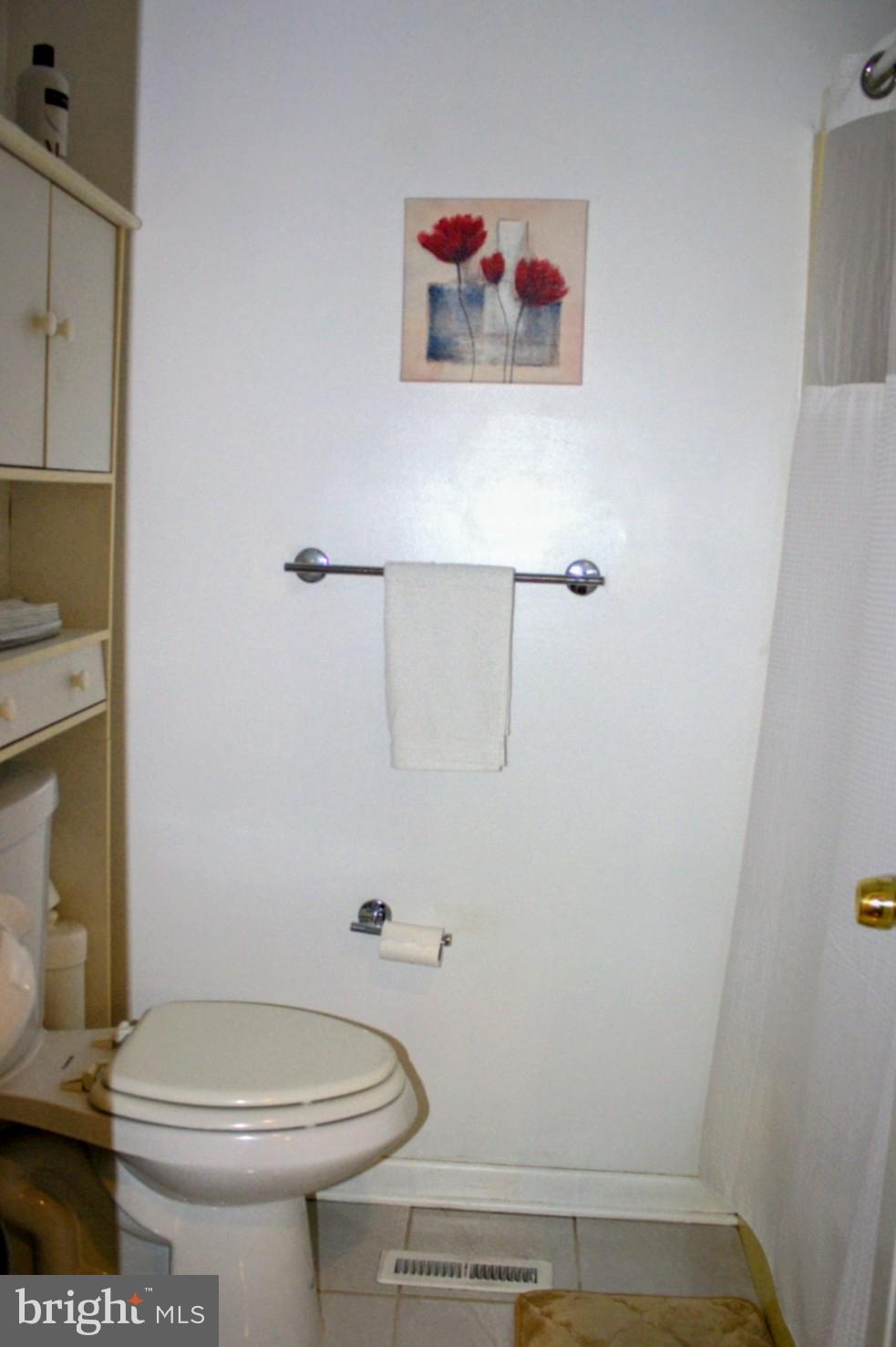 1902 Valley Terrace Southeast Washington, DC 20032 - Photo 23 of 38 a bathroom with a toilet and a sink