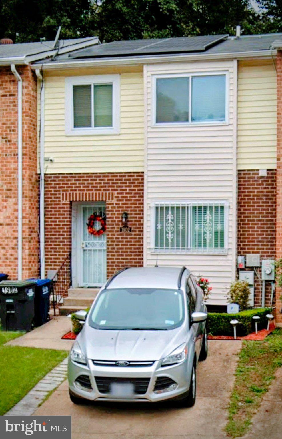 1902 Valley Terrace Southeast Washington, DC 20032 - Photo 38 of 38 a swimming pool with outdoor seating and yard