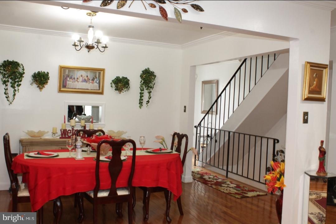 1902 Valley Terrace Southeast Washington, DC 20032 - Photo 8 of 38 a view of a dining room with furniture and chandelier