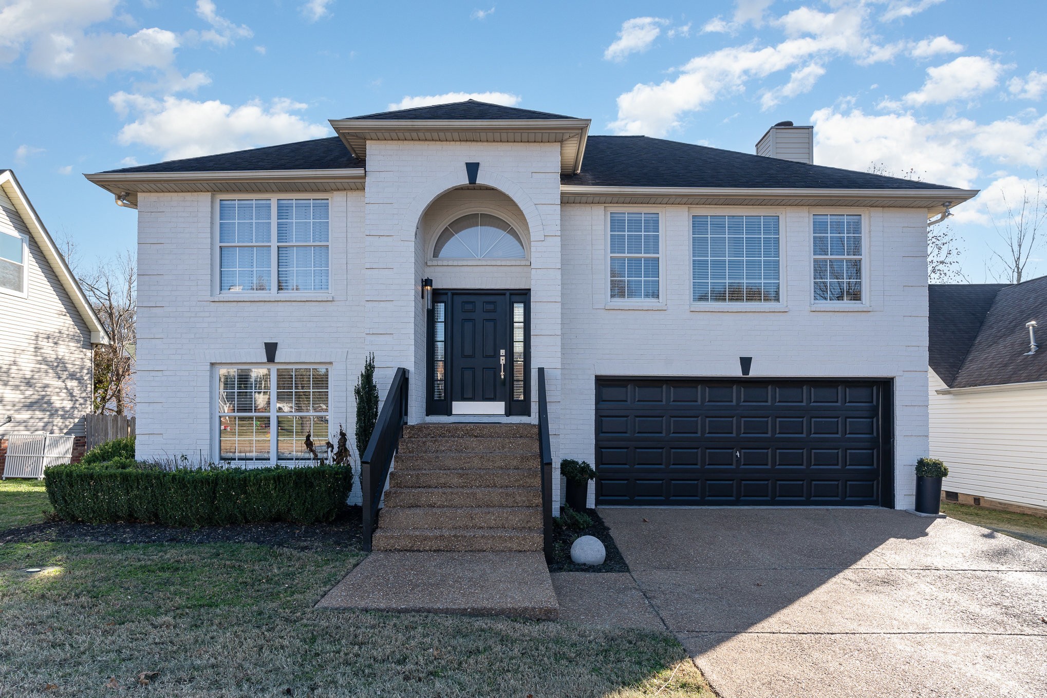3014 Bent Tree Road Franklin, TN 37067 - Photo 2 of 17 a front view of a house with a yard