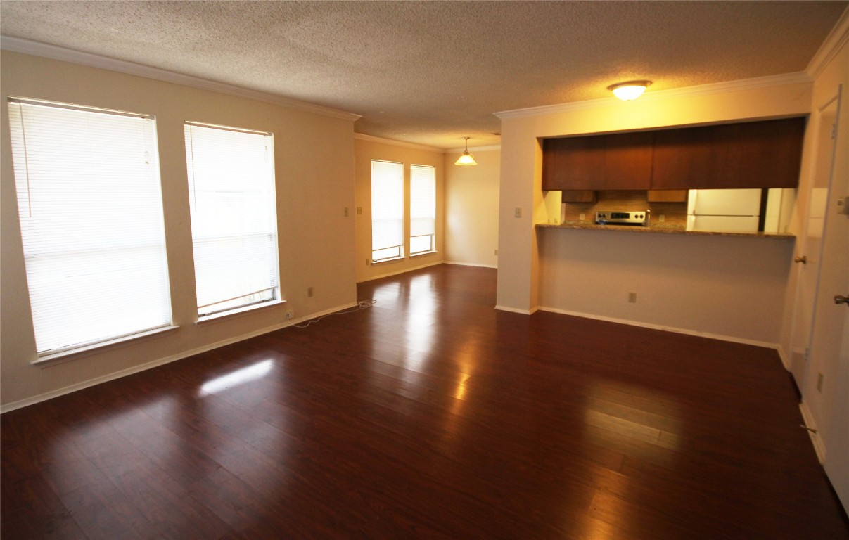 1405 D Camp Craft Road, Unit D West Lake Hills, TX 78746 - Photo 5 of 10 a view of a room with wooden floor and a window