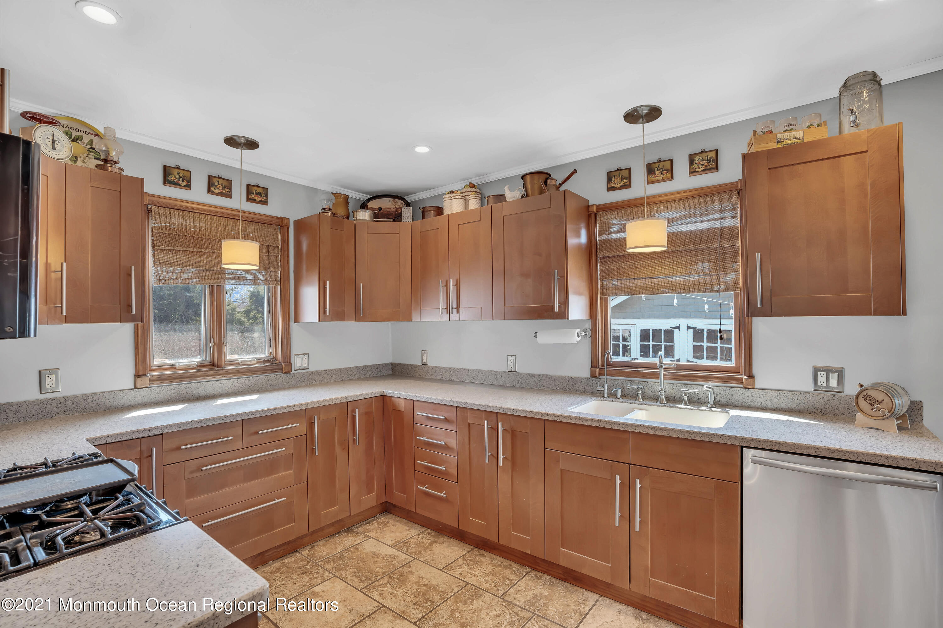 212 Oakhurst Road Oakhurst, NJ 07755 - Photo 11 of 35 a kitchen with granite countertop a sink stove and cabinets