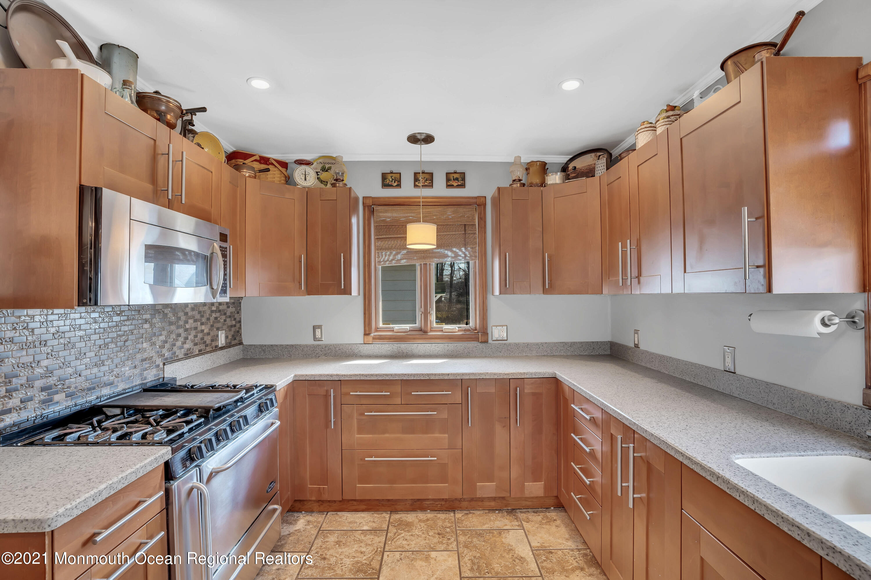 212 Oakhurst Road Oakhurst, NJ 07755 - Photo 12 of 35 a kitchen with a stove and a sink