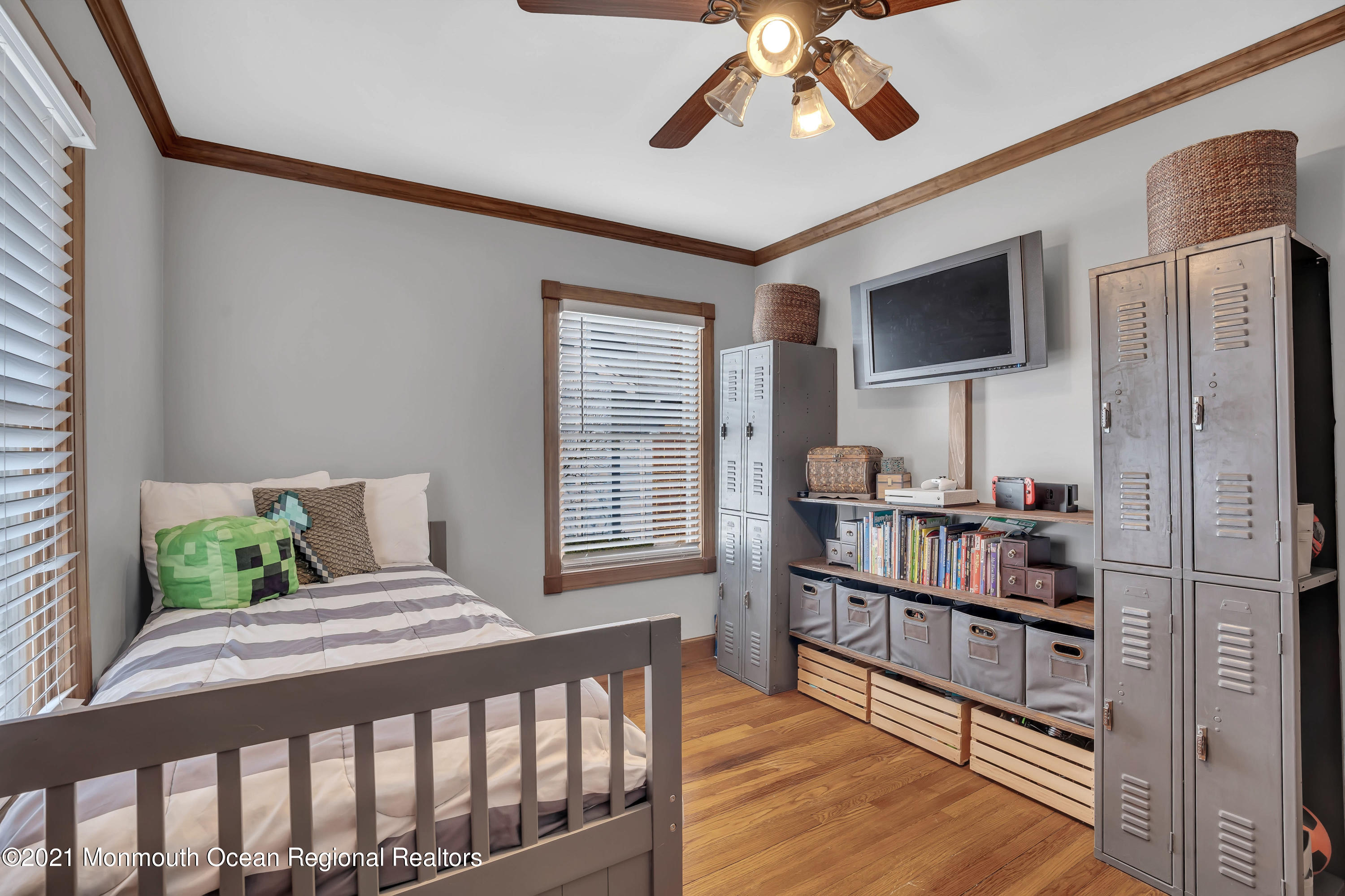 212 Oakhurst Road Oakhurst, NJ 07755 - Photo 19 of 35 a bedroom with furniture and a window