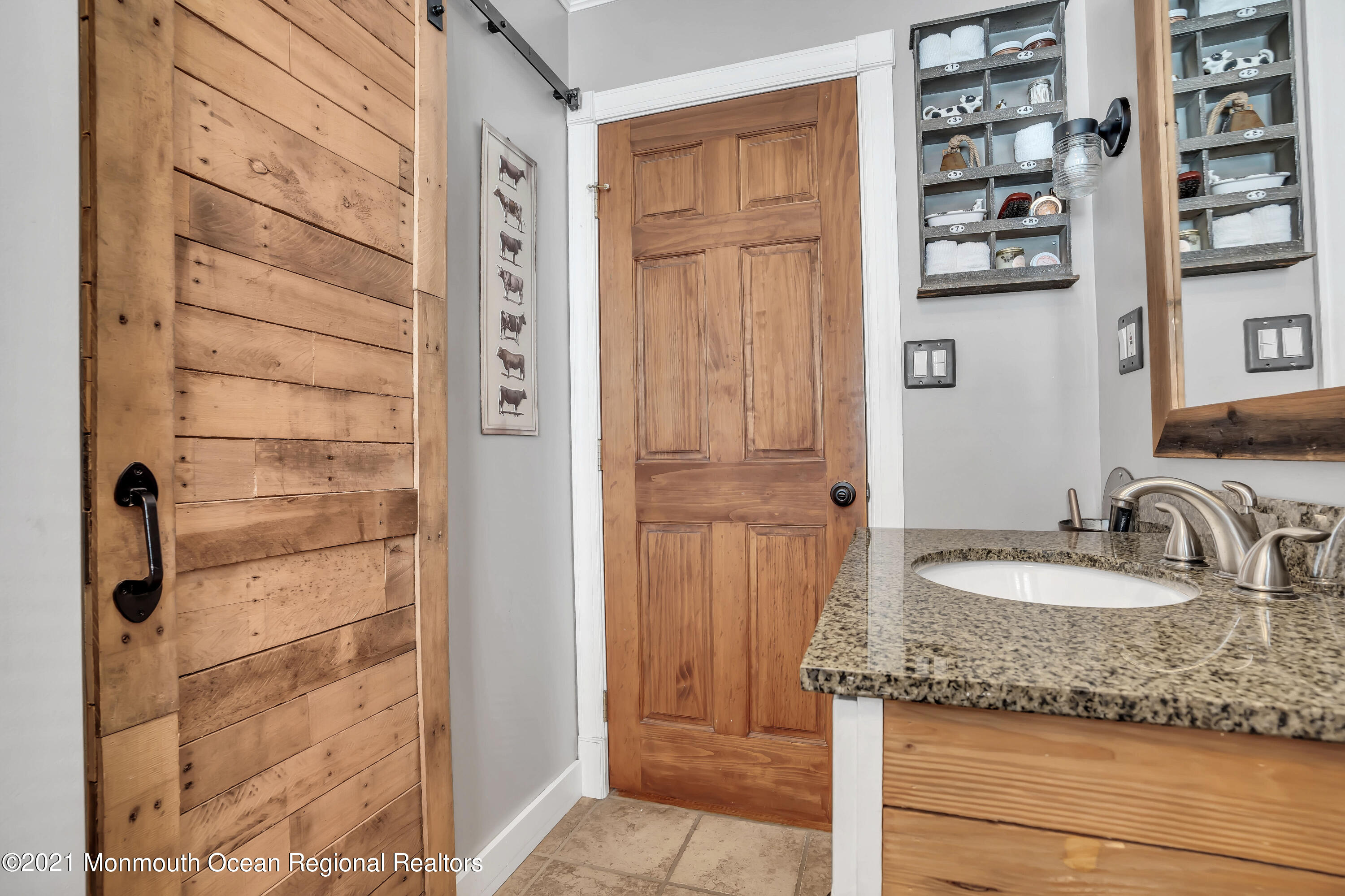 212 Oakhurst Road Oakhurst, NJ 07755 - Photo 21 of 35 a bathroom with a granite countertop shower and a sink