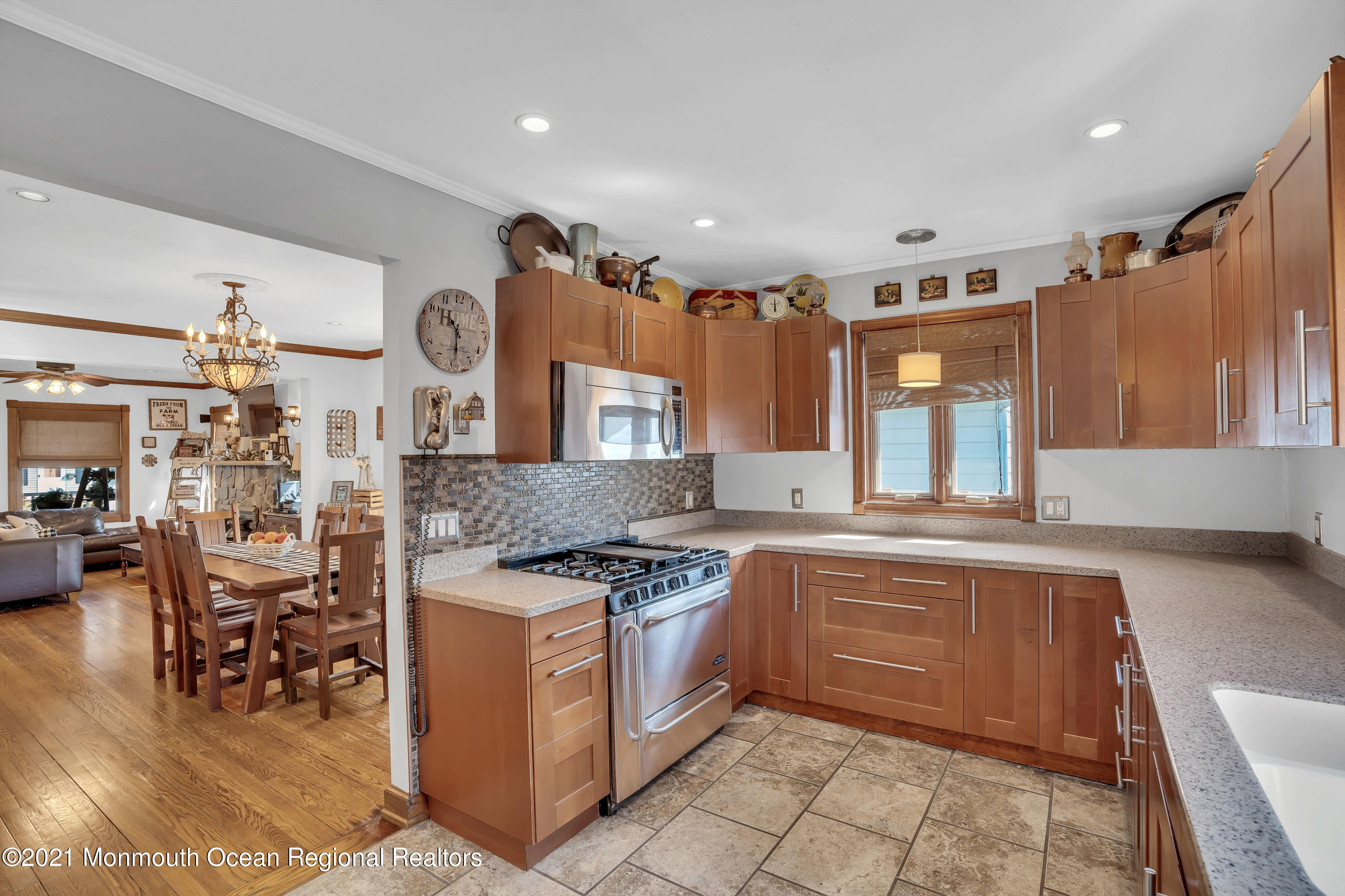 212 Oakhurst Road Oakhurst, NJ 07755 - Photo 10 of 35 a kitchen with a stove and a refrigerator