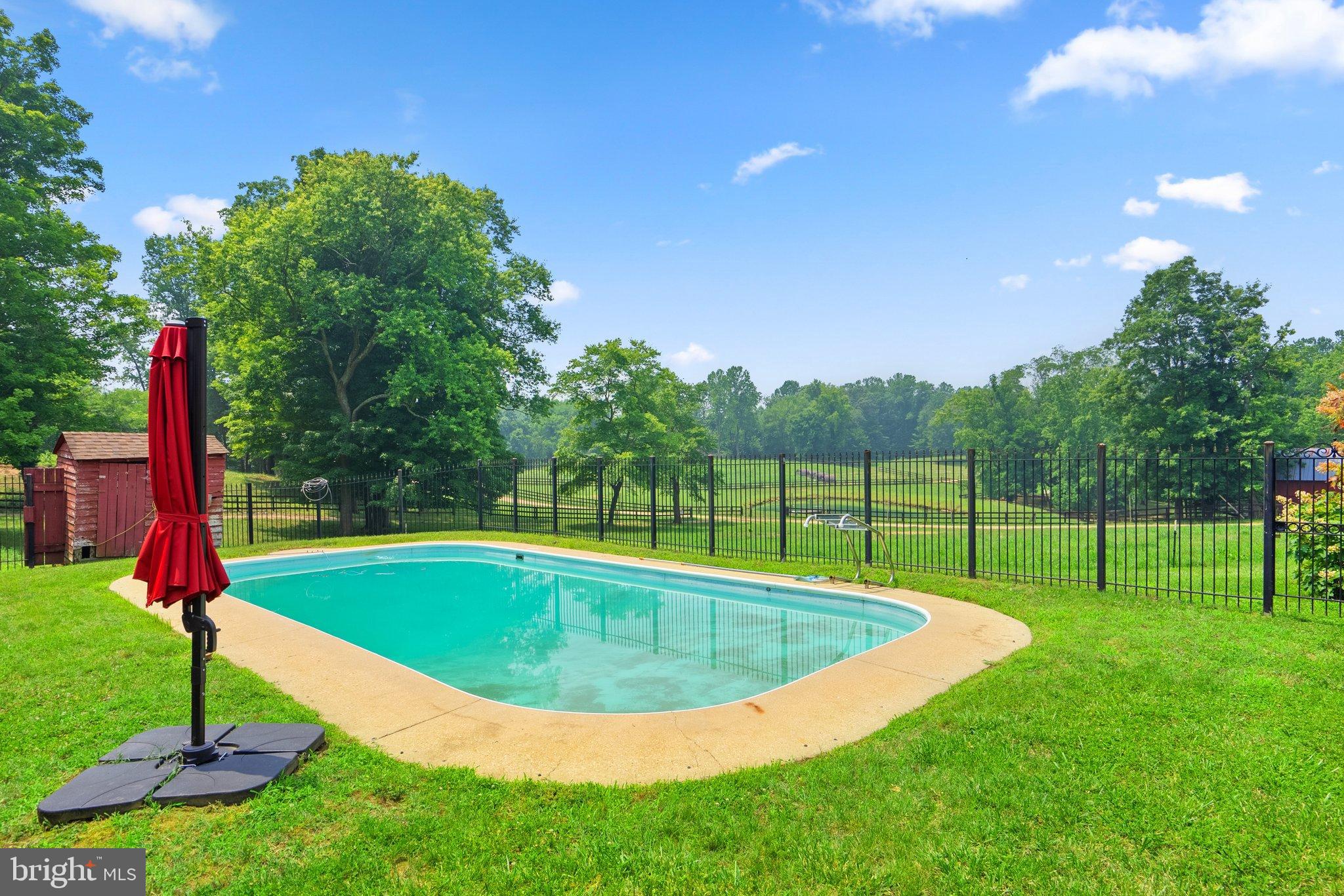 15701 Dr Bowen Road Aquasco, MD 20608 - Photo 54 of 89 Serene poolside retreat in lush greenery