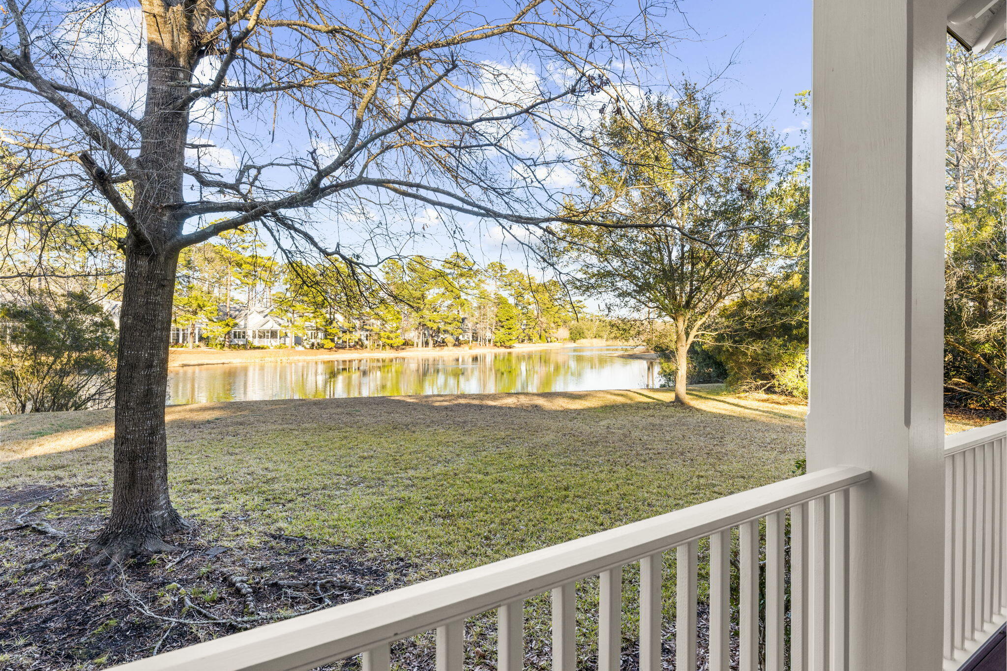 4104 Ten Shillings Way Ravenel, SC 29470 - Photo 10 of 64 Wide Back Porch overlooking the lagoon!