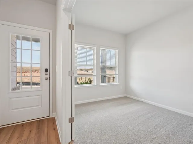 an empty room with windows