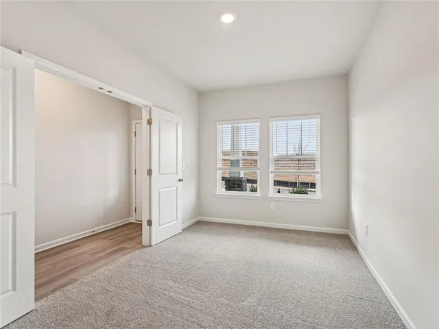 an empty room with windows