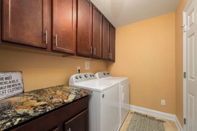 a bathroom with a sink and cabinets
