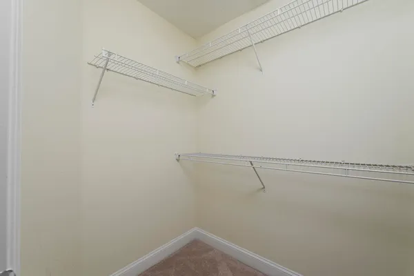 a view of small space with racks on the wall