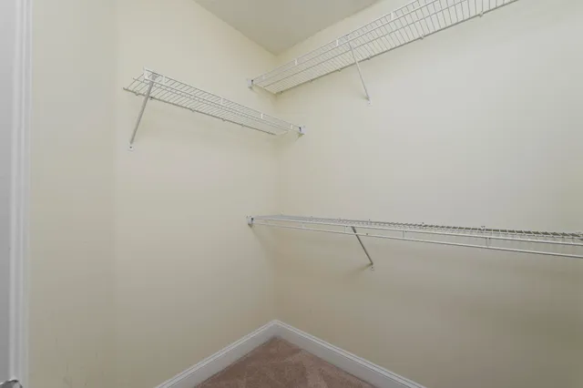 a view of small space with racks on the wall