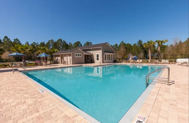 a view of a lake with a house