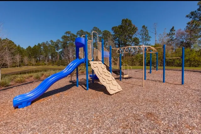 a view of a park with slide