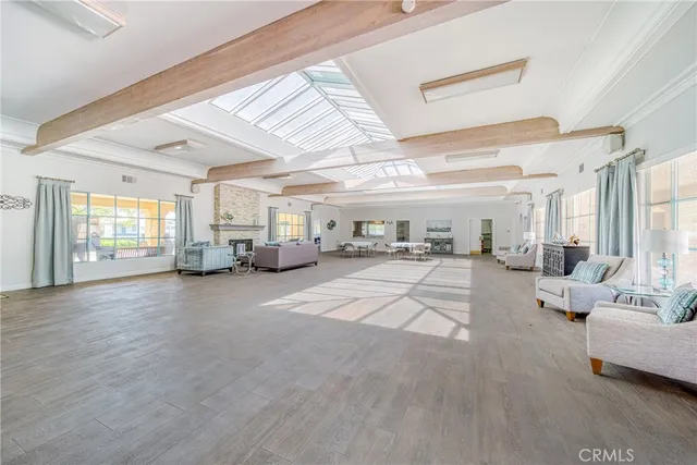 a room with furniture and pool table