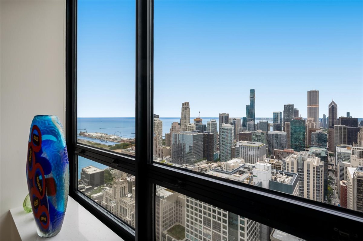 180 East Pearson Street, Unit 5107 Chicago, IL 60611 - Photo 18 of 42 a view of a city from a balcony