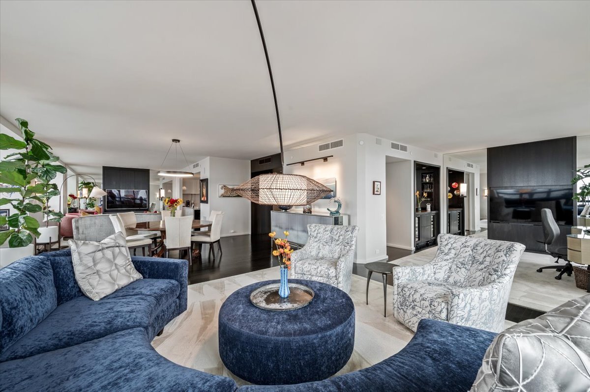 180 East Pearson Street, Unit 5107 Chicago, IL 60611 - Photo 6 of 42 a living room with furniture and a wooden floor