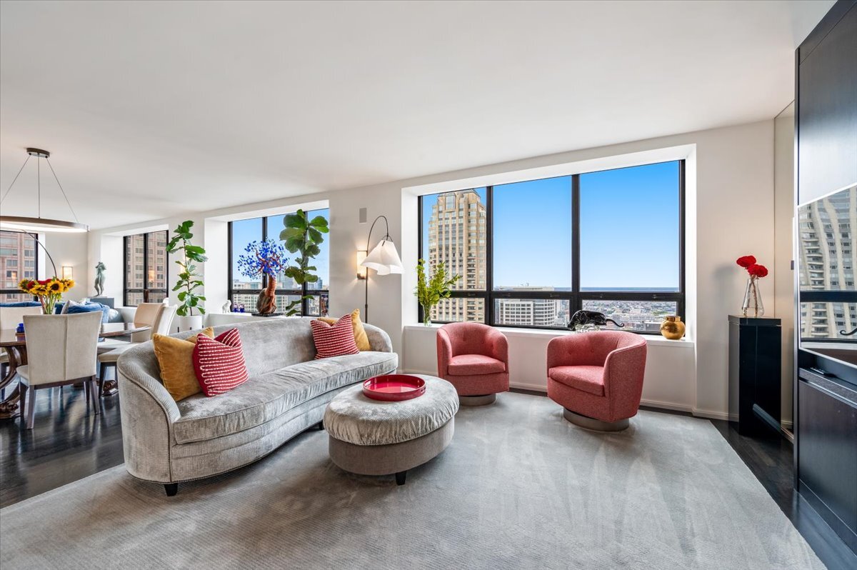 180 East Pearson Street, Unit 5107 Chicago, IL 60611 - Photo 7 of 42 a living room with furniture and a large window
