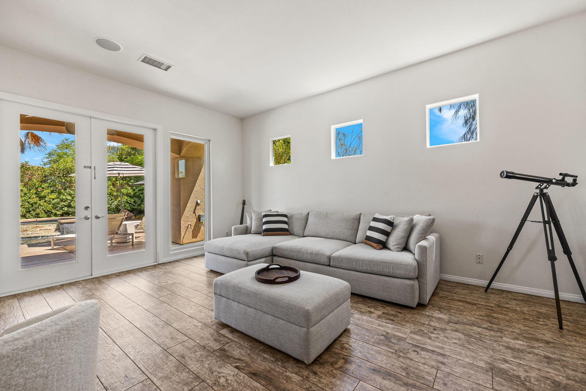 32 Calais Circle Rancho Mirage, CA 92270 - Photo 12 of 56 a living room with furniture and a wooden floor