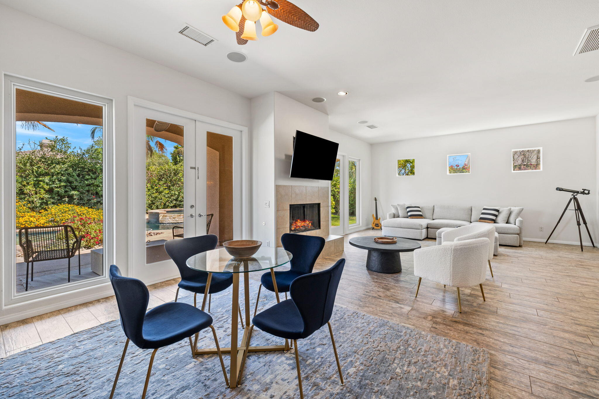 32 Calais Circle Rancho Mirage, CA 92270 - Photo 14 of 56 a view of a dining room with furniture window and wooden floor