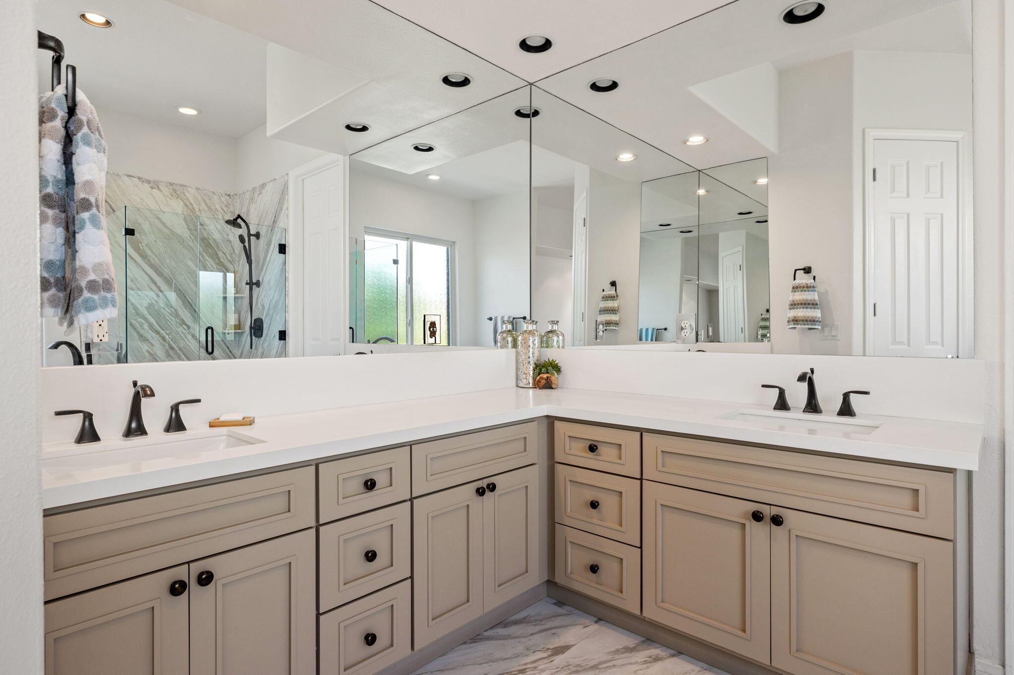 32 Calais Circle Rancho Mirage, CA 92270 - Photo 29 of 56 a bathroom with a double vanity sink mirror and