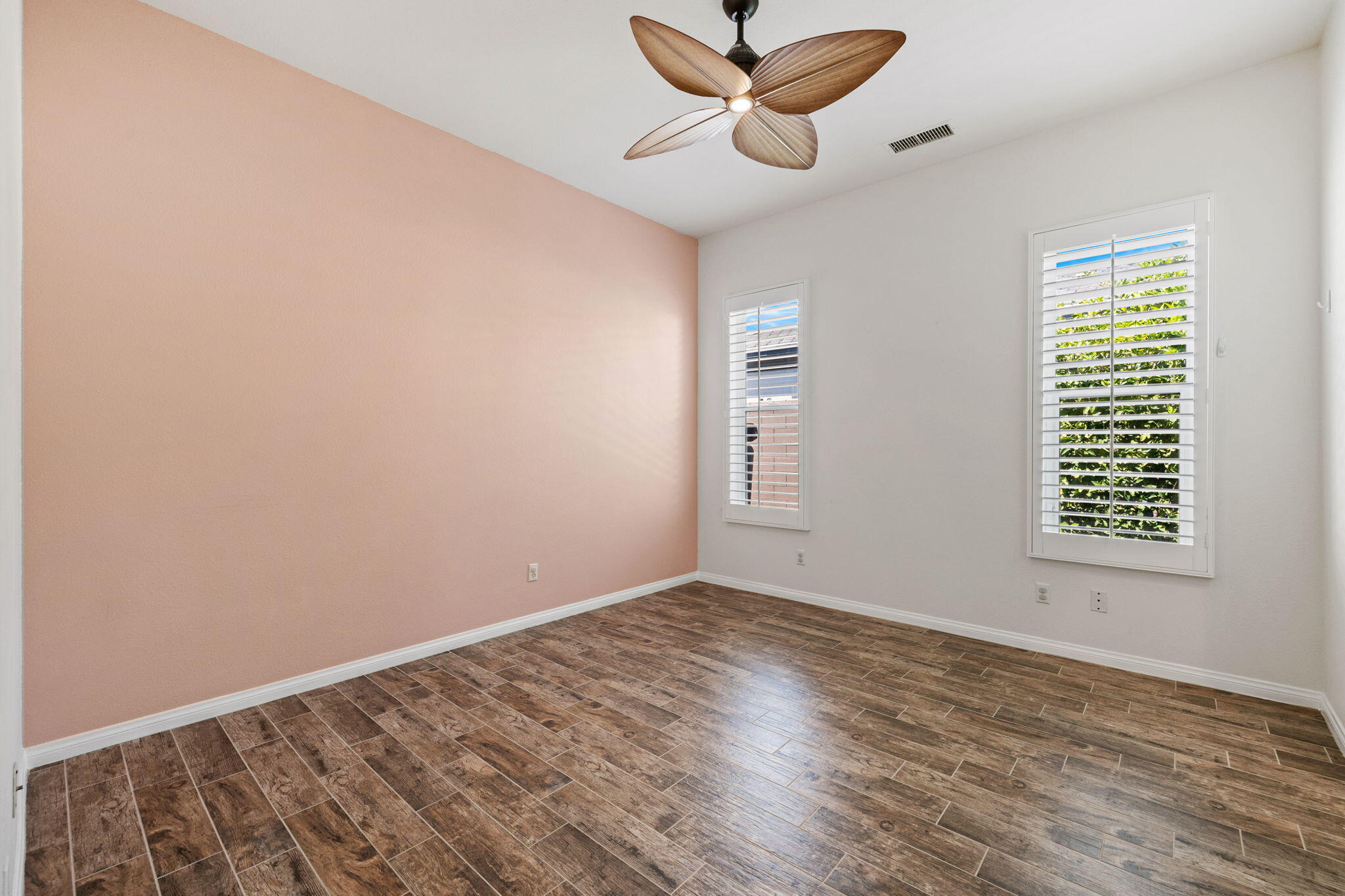 32 Calais Circle Rancho Mirage, CA 92270 - Photo 35 of 56 an empty room with a window and a fan