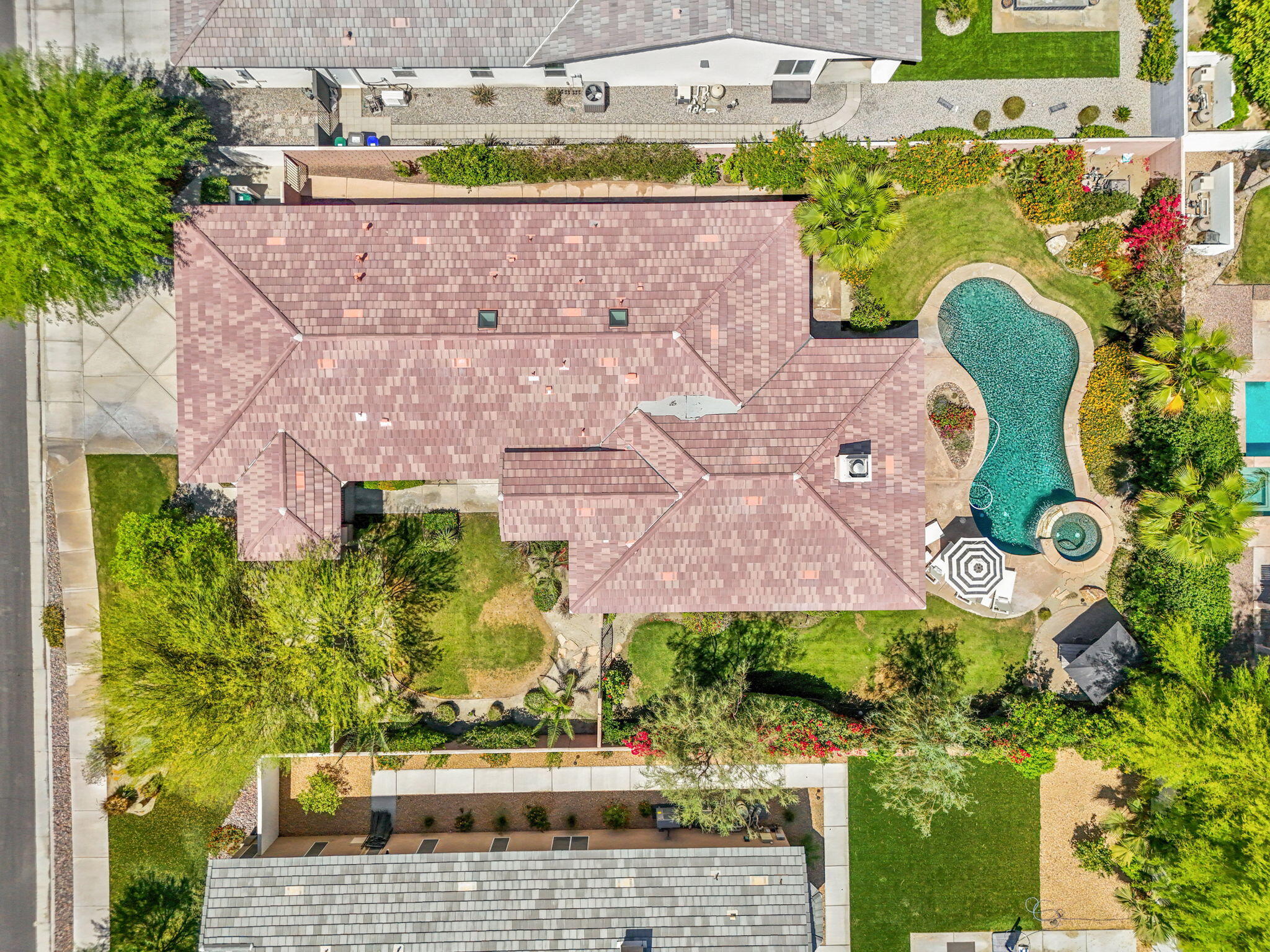 32 Calais Circle Rancho Mirage, CA 92270 - Photo 41 of 56 an aerial view of a house with a swimming pool