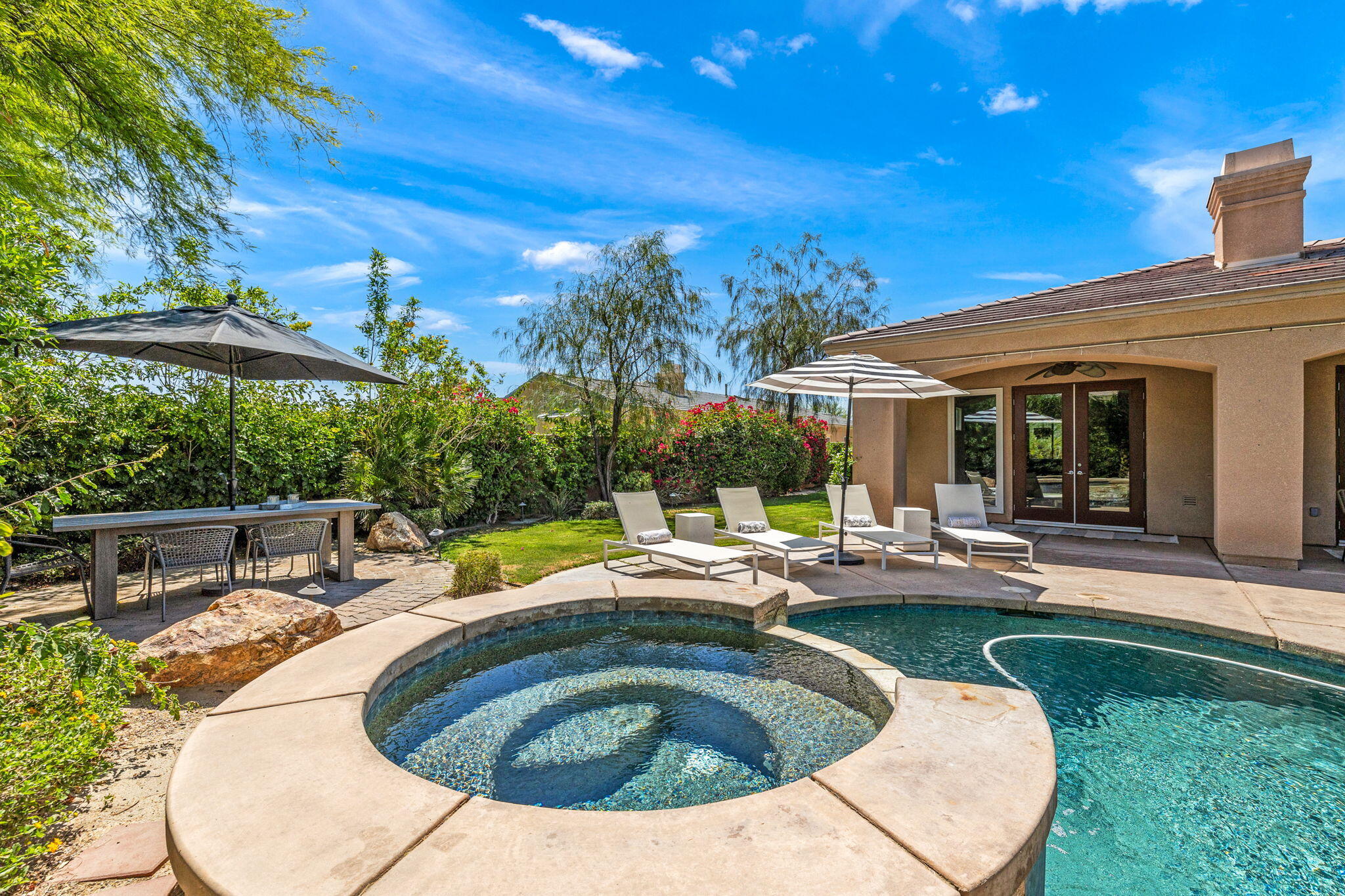 32 Calais Circle Rancho Mirage, CA 92270 - Photo 45 of 56 a view of a house with swimming pool