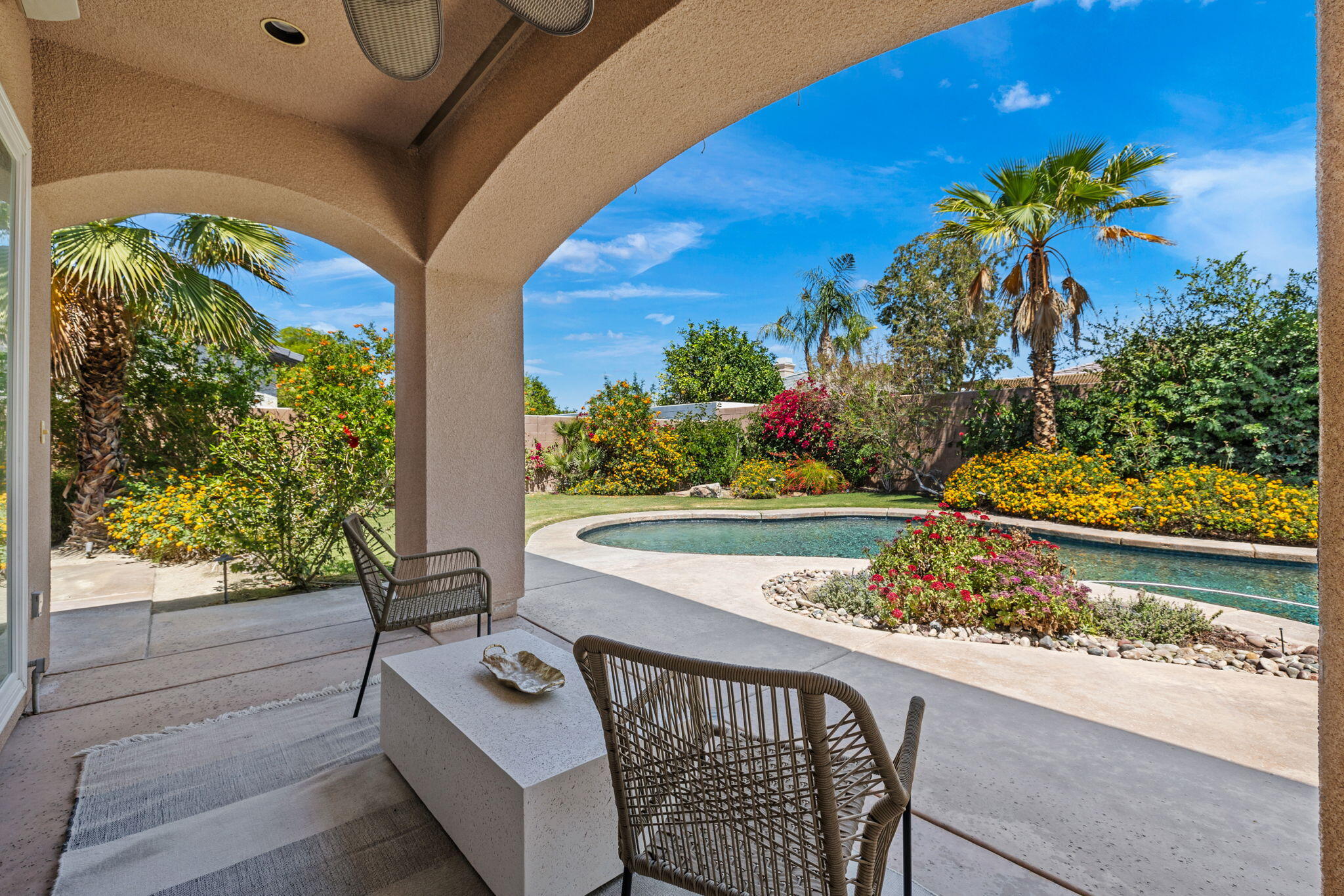 32 Calais Circle Rancho Mirage, CA 92270 - Photo 48 of 56 a view of a balcony with two chairs