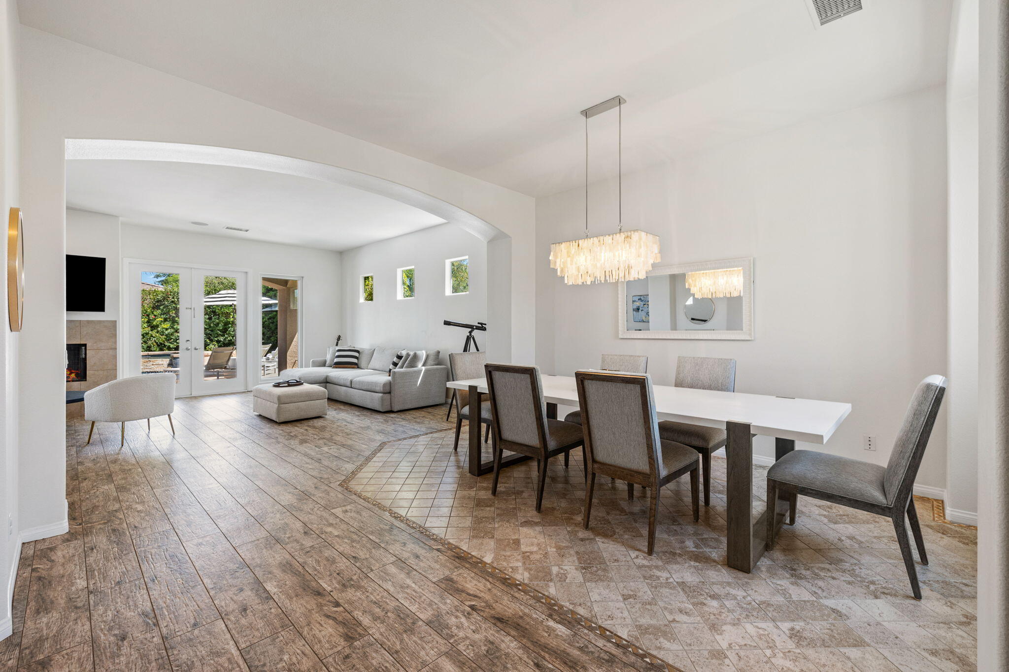 32 Calais Circle Rancho Mirage, CA 92270 - Photo 9 of 56 a view of a dining room with furniture window and wooden floor