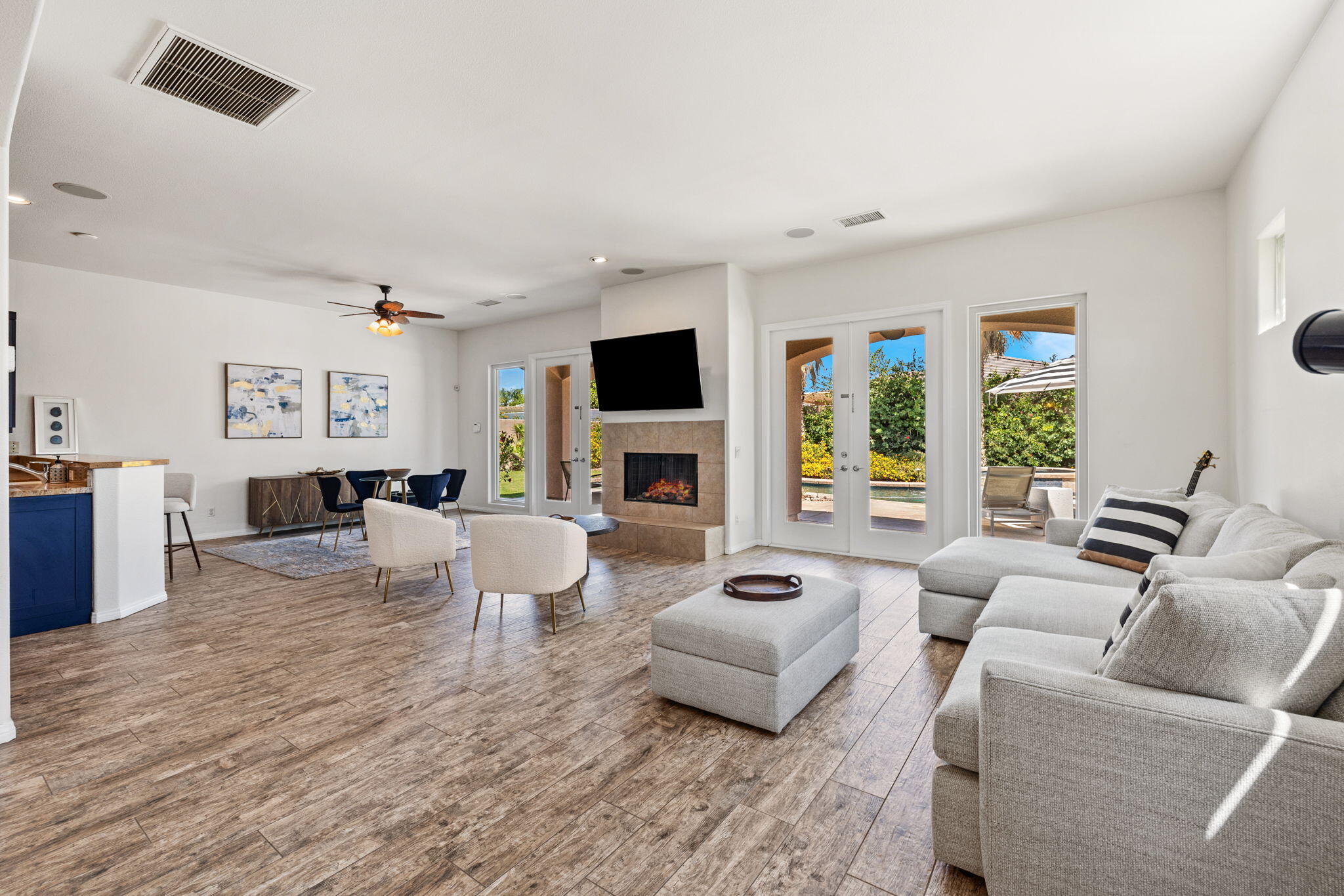 32 Calais Circle Rancho Mirage, CA 92270 - Photo 10 of 56 a living room with furniture fireplace and a flat screen tv