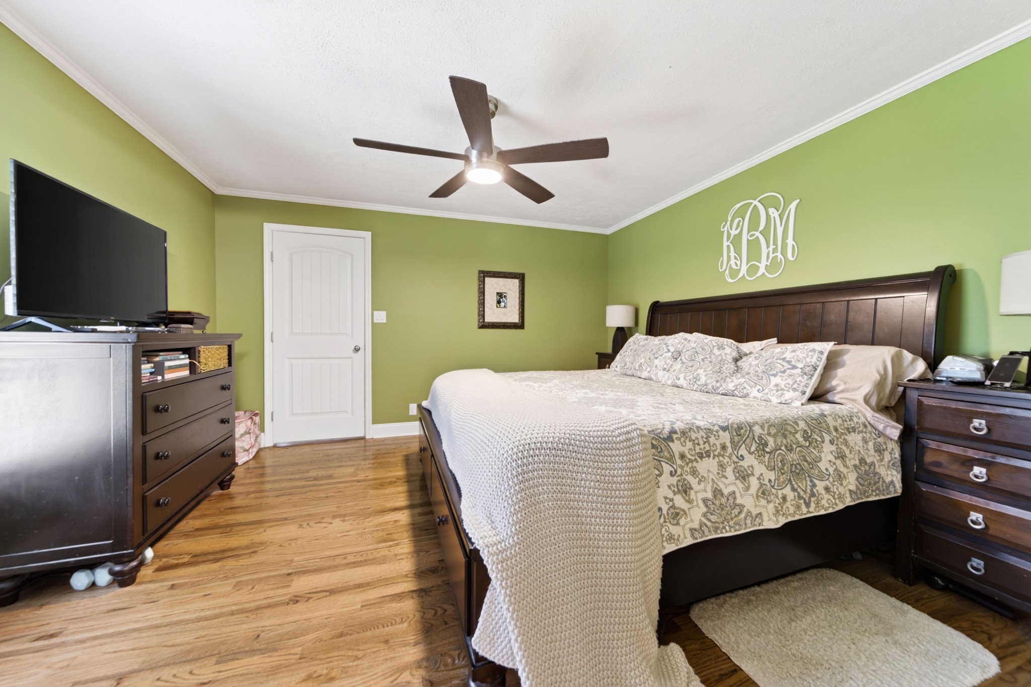 8023 Bethlehem Road Springfield, TN 37172 - Photo 39 of 55 a bedroom with a bed and a flat screen tv