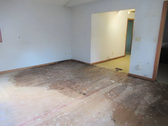 a view of a room with drop ceiling